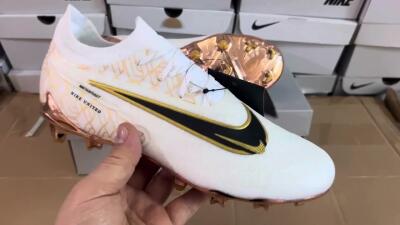 Nike Phantom GX Elite United Golden Pack FG Low-Tops Soccer Cleats - White/Metallic Gold/Black